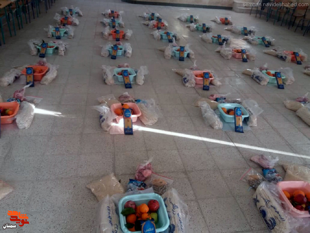 توزیع بسته‌های یلدایی با نام و یاد شهدای شهرستان آرادان به منیازمندان به مناسبت شب یلدا - سی‌ام آذرماه ۱۴۰۰ شهرستان آرادان