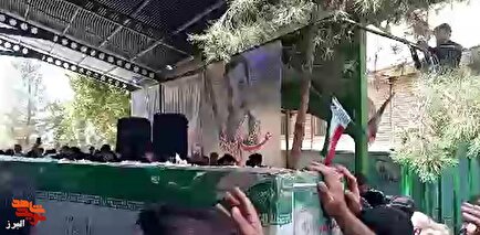 کلیپ| خاکسپاری پیکر شهید مهندس «سیدامیرحسین خادمی» در میدان گلزار شهدای نظرآباد